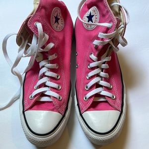 selling converse high tops, in good condition, worn once, canvas like fabric.